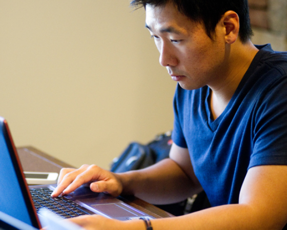 man working on laptop