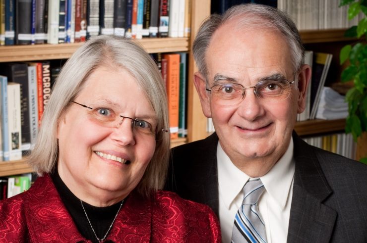 man and woman smiling for picture