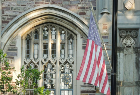 american flag in front of church